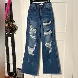Vibrant Blue Flare Wide Leg Jeans with Distressed Details